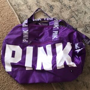 PINK - purple duffel bag.